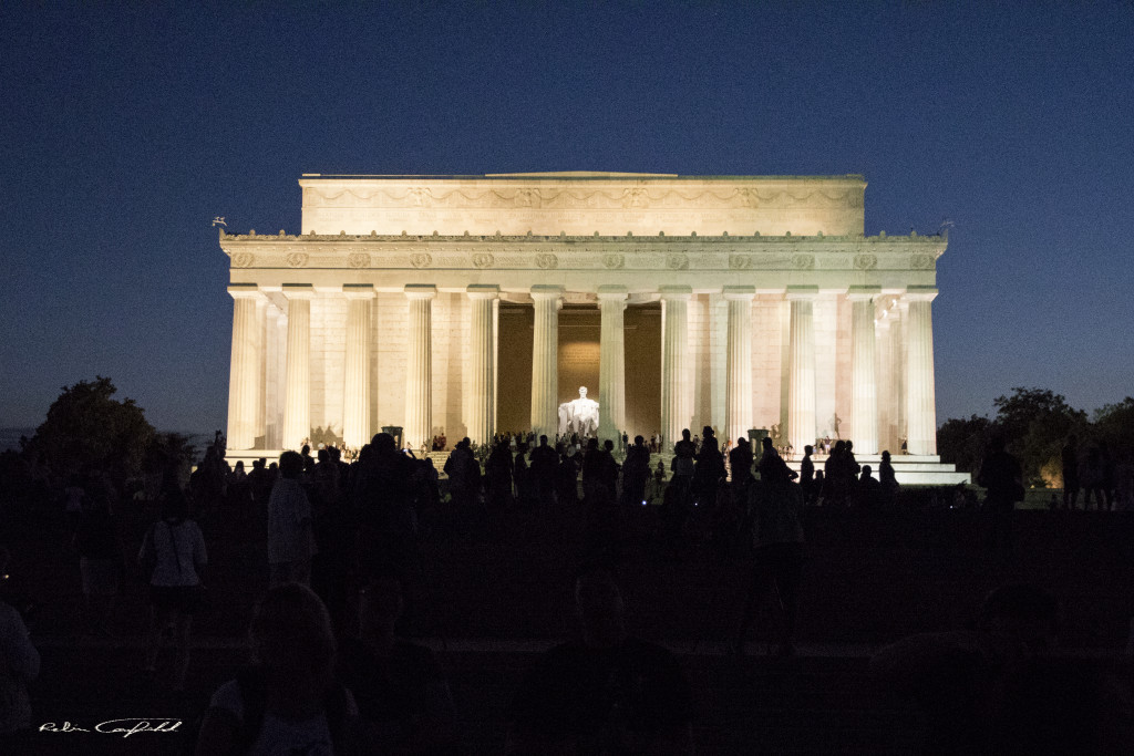 Photographers gather before the Lincoln Memorial at night. Washington, D.C. - August, 2015