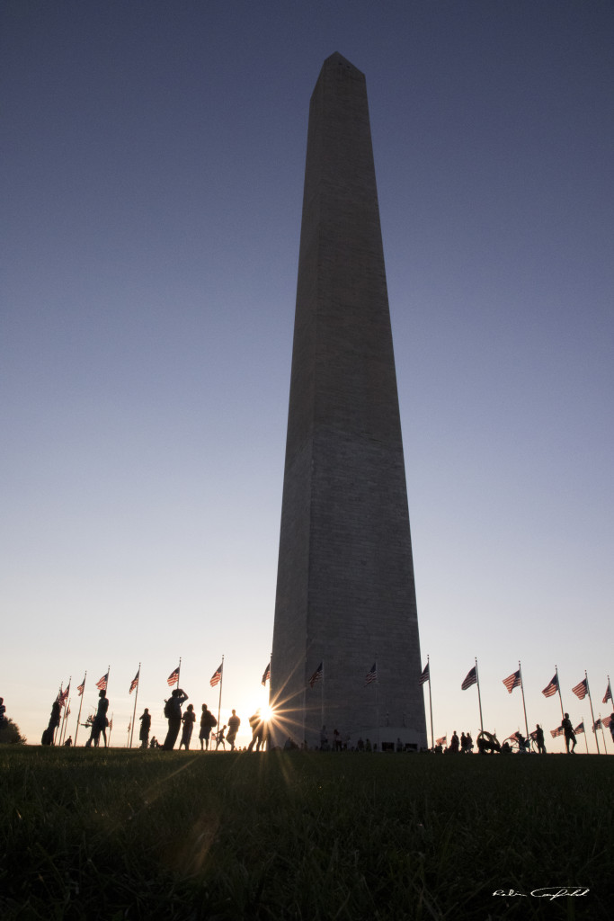 The last rays of sunlight hit the Washington Monument. Washington, D.C. - August, 2015